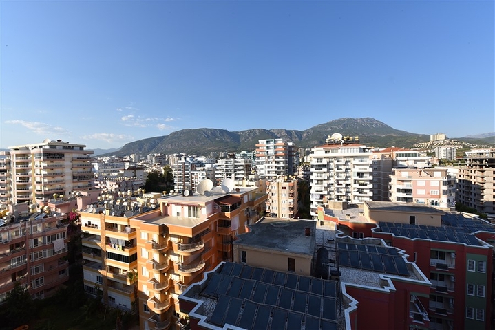 اول صف على البحر - شقة غرفتين وصالة طابق مرتفع -- مهموتلار / الانيا 