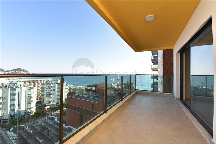 اول صف على البحر - شقة غرفتين وصالة طابق مرتفع -- مهموتلار / الانيا 