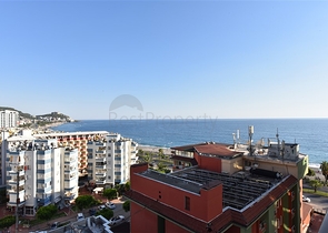 اول صف على البحر - شقة غرفتين وصالة طابق مرتفع -- مهموتلار / الانيا 