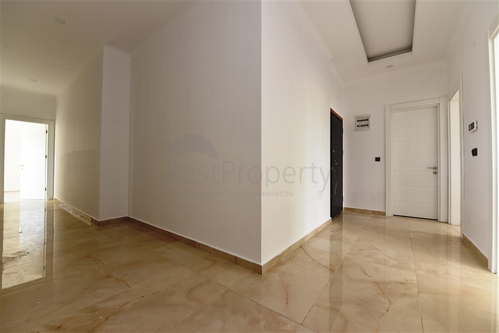 شقة طابق ارضي - تصميم 3 غرف وصالة - ضمن مجمع فاخر في منطقة اوبا / الانيا 