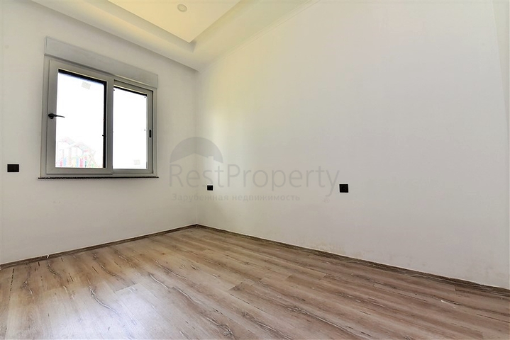 شقة طابق ارضي - تصميم 3 غرف وصالة - ضمن مجمع فاخر في منطقة اوبا / الانيا 