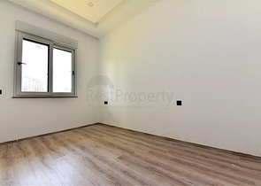 شقة طابق ارضي - تصميم 3 غرف وصالة - ضمن مجمع فاخر في منطقة اوبا / الانيا 