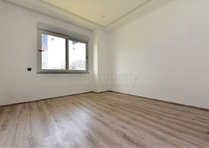 شقة طابق ارضي - تصميم 3 غرف وصالة - ضمن مجمع فاخر في منطقة اوبا / الانيا 