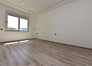 شقة طابق ارضي - تصميم 3 غرف وصالة - ضمن مجمع فاخر في منطقة اوبا / الانيا 