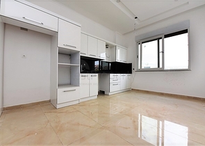 شقة طابق ارضي - تصميم 3 غرف وصالة - ضمن مجمع فاخر في منطقة اوبا / الانيا 