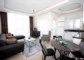 اطلالة بحر - شقة مفروشة ضمن مجمع حديث - تصميم 1+1 في مهموتلار /الانيا 