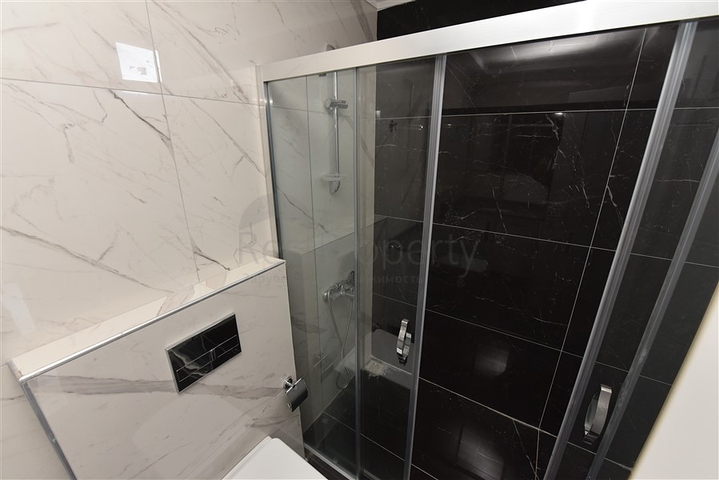 شقة غرفتين وصالة - ضمن مجمع حديث - قريبة من البحر - في كارجي جاك / الانيا 