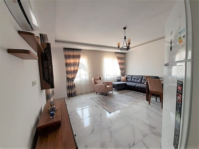 شقة جديدة -من تصميم 1+1 - مع الفرش -ضمن مجمع سكني قريب من البحر / مهموتلار /الانيا 