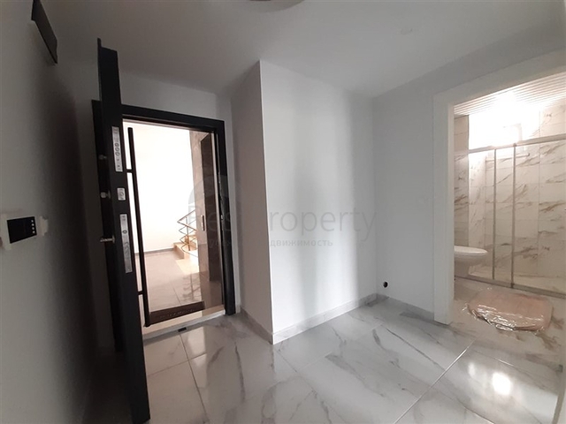 شقة جديدة -من تصميم 1+1 - مع الفرش -ضمن مجمع سكني قريب من البحر / مهموتلار /الانيا 