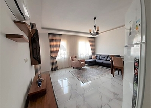 شقة جديدة -من تصميم 1+1 - مع الفرش -ضمن مجمع سكني قريب من البحر / مهموتلار /الانيا 