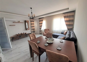 شقة جديدة -من تصميم 1+1 - مع الفرش -ضمن مجمع سكني قريب من البحر / مهموتلار /الانيا 