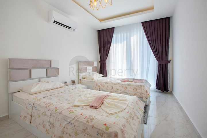 طابق مرتفع -اطلالة بحر - شقة مفروشة غرفتين وصالة - في مهموتلار / الانيا 