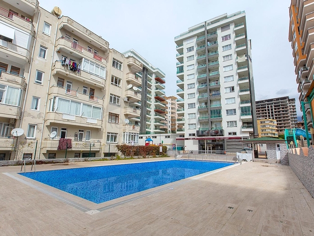 طابق مرتفع -اطلالة بحر - شقة مفروشة غرفتين وصالة - في مهموتلار / الانيا 