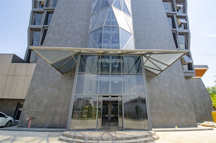 مكاتب 2 + 1 ومحل للبيع في كيبيز أنطاليا