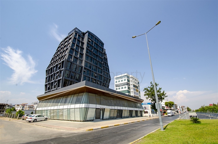 مكاتب 2 + 1 ومحل للبيع في كيبيز أنطاليا