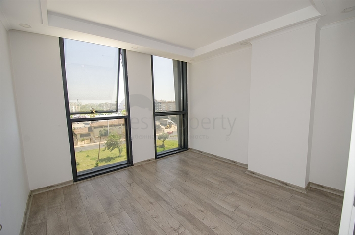 مكاتب 2 + 1 ومحل للبيع في كيبيز أنطاليا