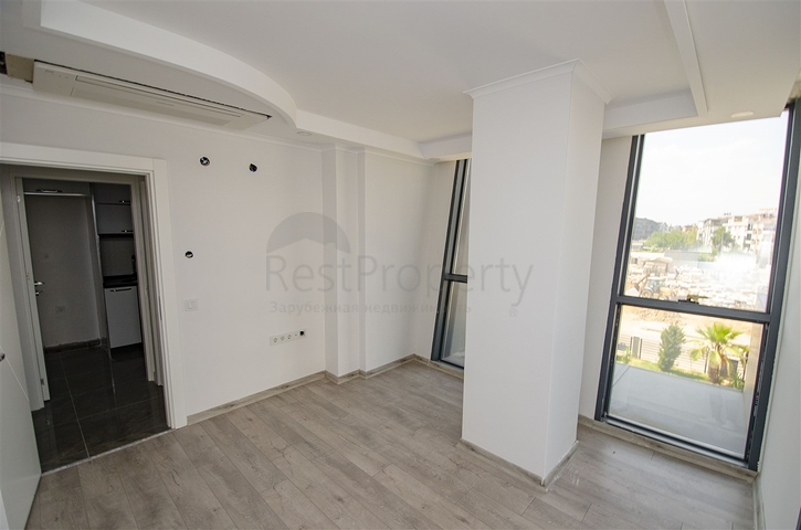 مكاتب 2 + 1 ومحل للبيع في كيبيز أنطاليا