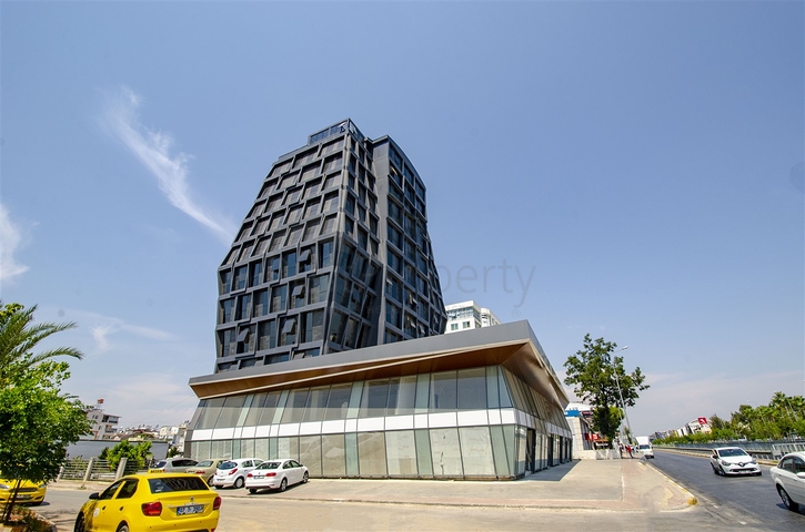 مكاتب 2 + 1 ومحل للبيع في كيبيز أنطاليا