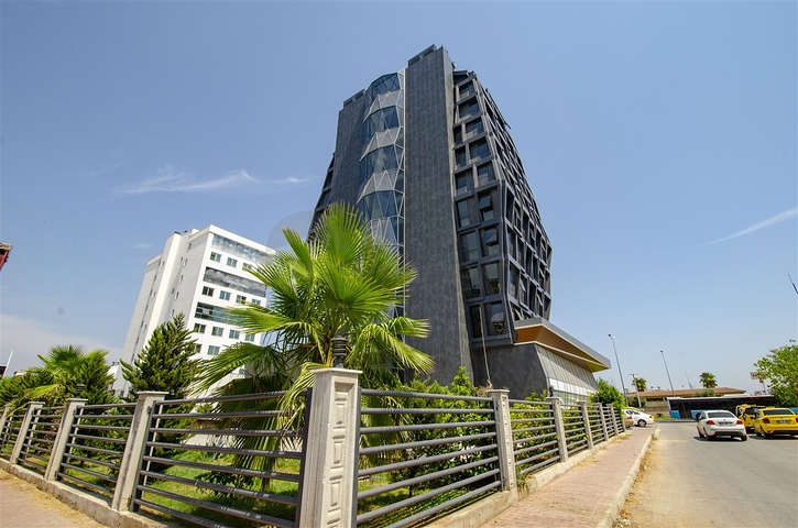 مكاتب 2 + 1 ومحل للبيع في كيبيز أنطاليا