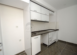 مكاتب 2 + 1 ومحل للبيع في كيبيز أنطاليا