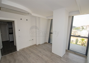 مكاتب 2 + 1 ومحل للبيع في كيبيز أنطاليا