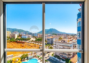 اطلالة بحر مباشرة - شقة مفروشة - تصميم 1+2 - في منطقة توسمور المركزية / الانيا 