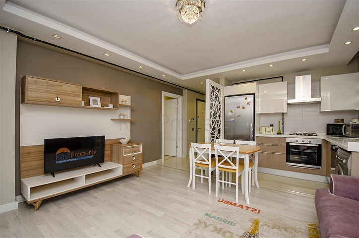 شقة بغرفة نوم واحدة مع أثاث في مشروع راقٍ في كونيالتي