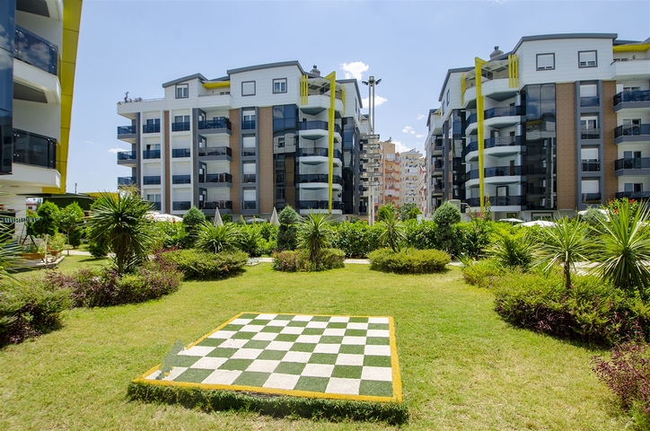 شقة بغرفة نوم واحدة مع أثاث في مشروع راقٍ في كونيالتي