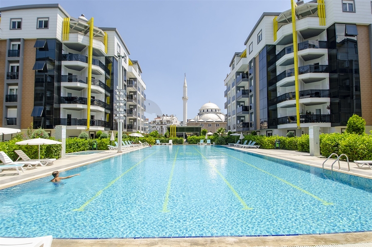 شقة بغرفة نوم واحدة مع أثاث في مشروع راقٍ في كونيالتي