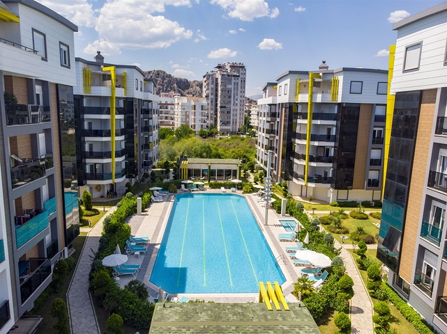 شقة بغرفة نوم واحدة مع أثاث في مشروع راقٍ في كونيالتي