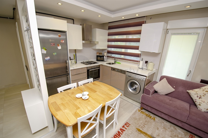 شقة بغرفة نوم واحدة مع أثاث في مشروع راقٍ في كونيالتي