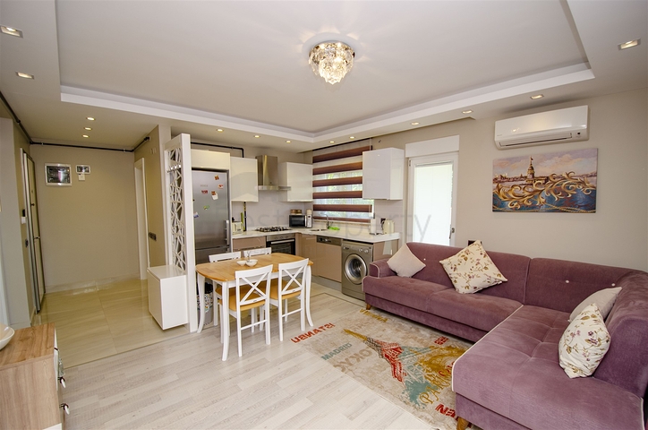 شقة بغرفة نوم واحدة مع أثاث في مشروع راقٍ في كونيالتي