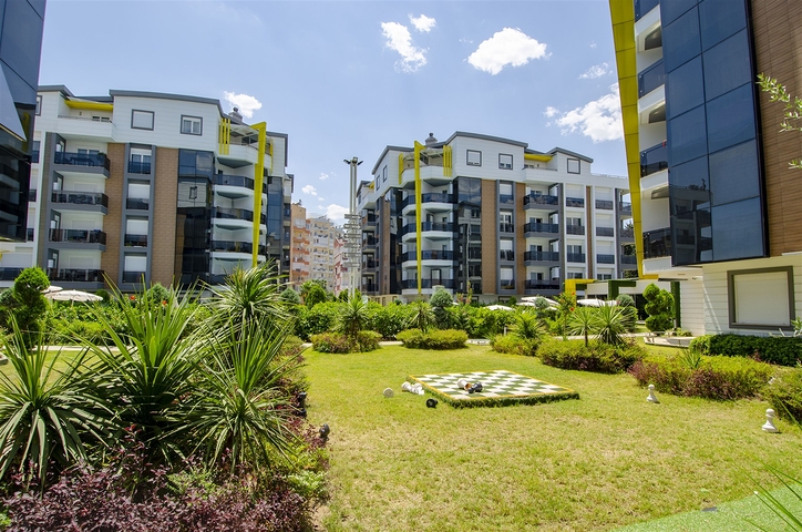 شقة بغرفة نوم واحدة مع أثاث في مشروع راقٍ في كونيالتي