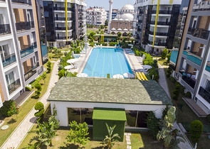 شقة بغرفة نوم واحدة مع أثاث في مشروع راقٍ في كونيالتي