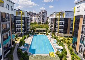 شقة بغرفة نوم واحدة مع أثاث في مشروع راقٍ في كونيالتي