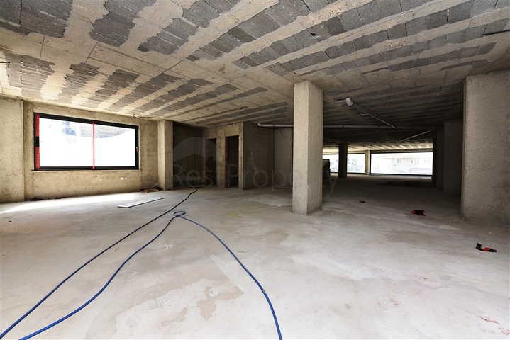 عقار تجاري في مركز المدينة - ضمن اكثر المناطق حيوية - الانيا 