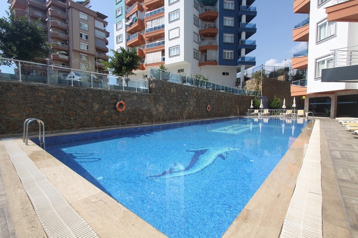 ضمن مجمع يضم خدمات - شقة مفروشة 1+1 - في منطقة توسمور المركزية / الانيا 