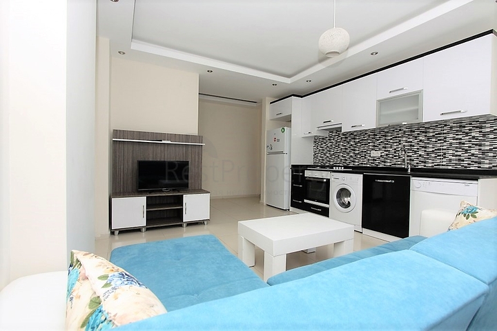 ضمن مجمع يضم خدمات - شقة مفروشة 1+1 - في منطقة توسمور المركزية / الانيا 