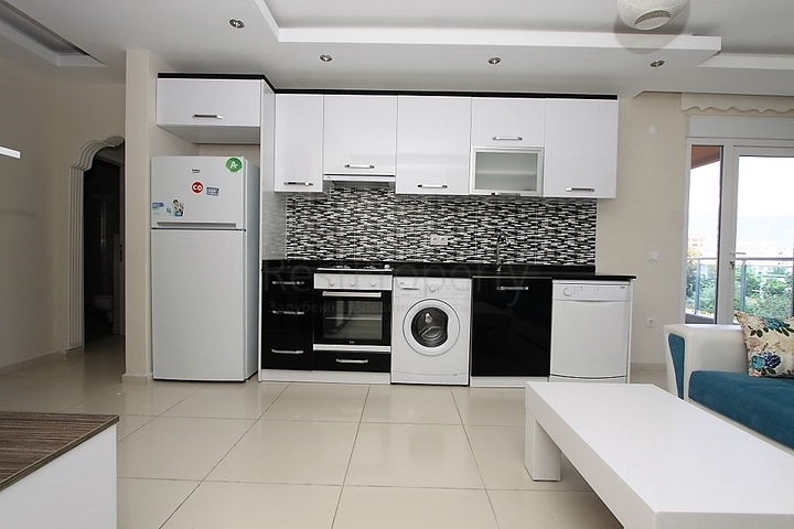 ضمن مجمع يضم خدمات - شقة مفروشة 1+1 - في منطقة توسمور المركزية / الانيا 