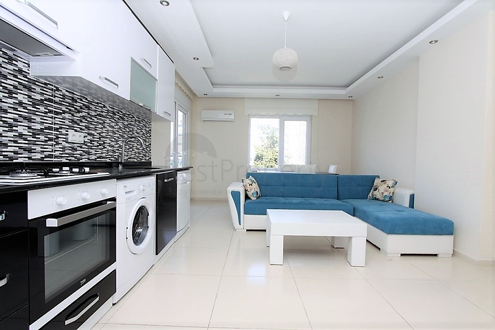 ضمن مجمع يضم خدمات - شقة مفروشة 1+1 - في منطقة توسمور المركزية / الانيا 