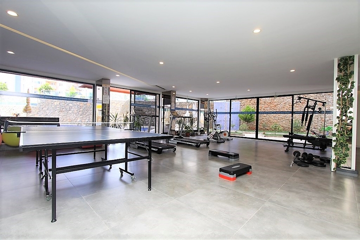 ضمن مجمع يضم خدمات - شقة مفروشة 1+1 - في منطقة توسمور المركزية / الانيا 