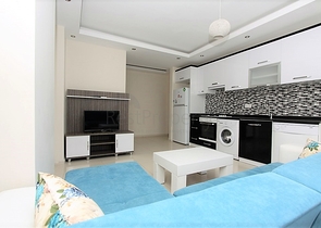 ضمن مجمع يضم خدمات - شقة مفروشة 1+1 - في منطقة توسمور المركزية / الانيا 