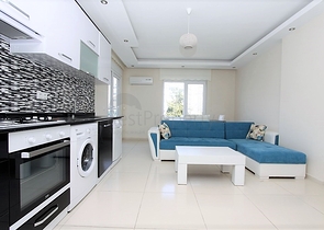 ضمن مجمع يضم خدمات - شقة مفروشة 1+1 - في منطقة توسمور المركزية / الانيا 