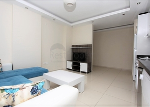 ضمن مجمع يضم خدمات - شقة مفروشة 1+1 - في منطقة توسمور المركزية / الانيا 