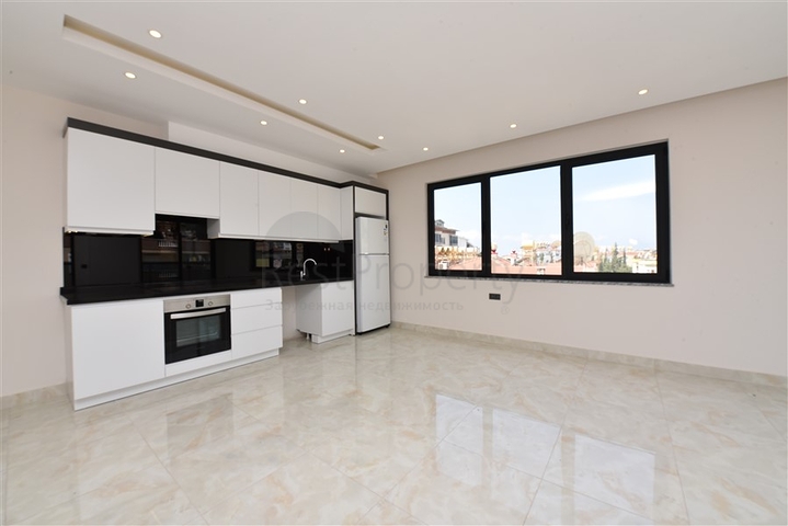 في المركز قريبة من الخدمات - شقة 1+1 - ضمن مجمع سكني فاخر / في مركز الانيا 