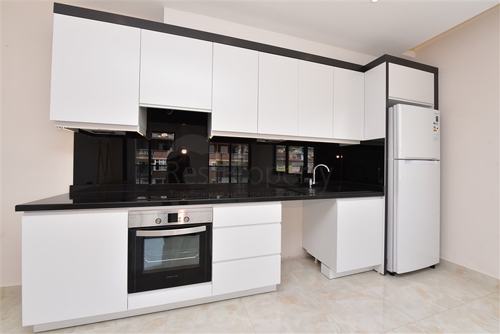 في المركز قريبة من الخدمات - شقة 1+1 - ضمن مجمع سكني فاخر / في مركز الانيا 