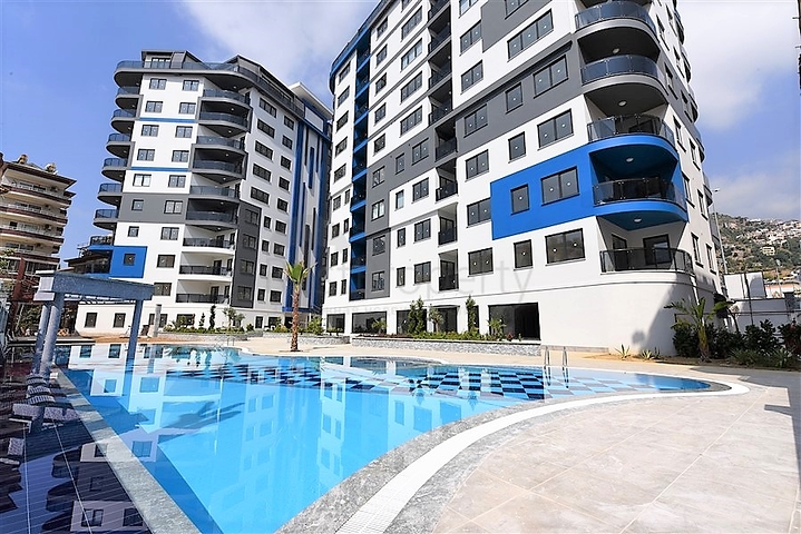 في المركز قريبة من الخدمات - شقة 1+1 - ضمن مجمع سكني فاخر / في مركز الانيا 