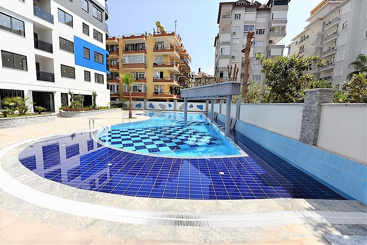 في المركز قريبة من الخدمات - شقة 1+1 - ضمن مجمع سكني فاخر / في مركز الانيا 