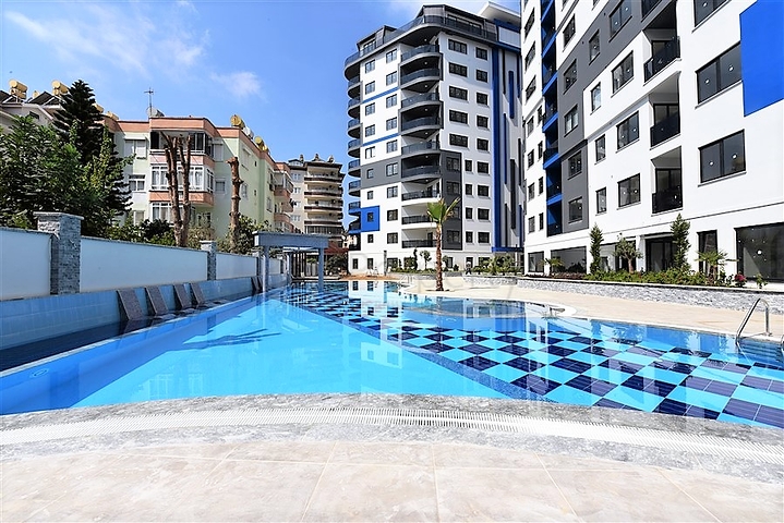 في المركز قريبة من الخدمات - شقة 1+1 - ضمن مجمع سكني فاخر / في مركز الانيا 