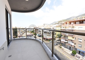 في المركز قريبة من الخدمات - شقة 1+1 - ضمن مجمع سكني فاخر / في مركز الانيا 